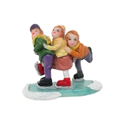 Kerstdorp>Kerstdorp schaatsende kinderen